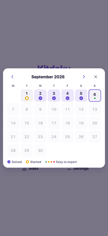 Kitdoku calendar showing solved and started daily puzzles