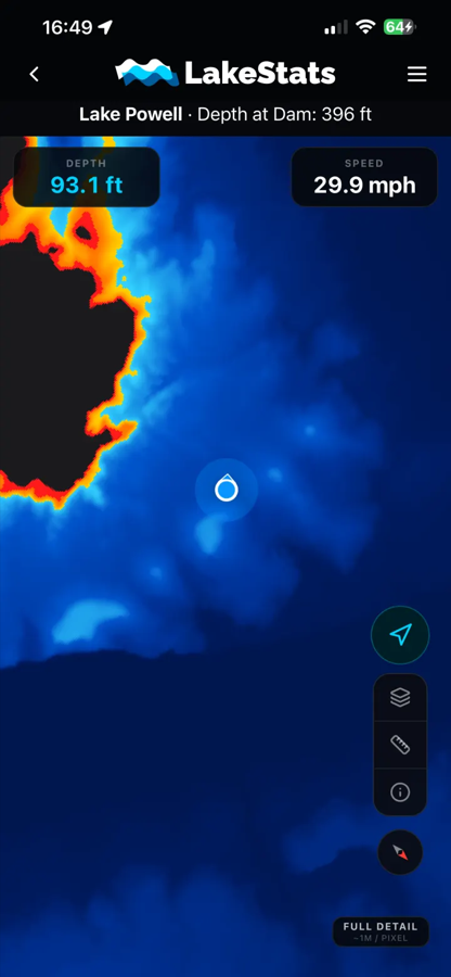 LakeStats Compass on Lake Powell: shallow water shaded red and orange, deep water blue, with the boat position, current depth, and speed on screen
